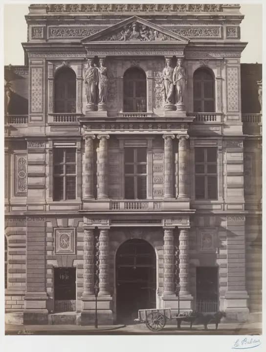 Stone facade with tall arched windows